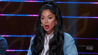 <i>The Masked Singer</i>: Who Is the Woman in Yellow?